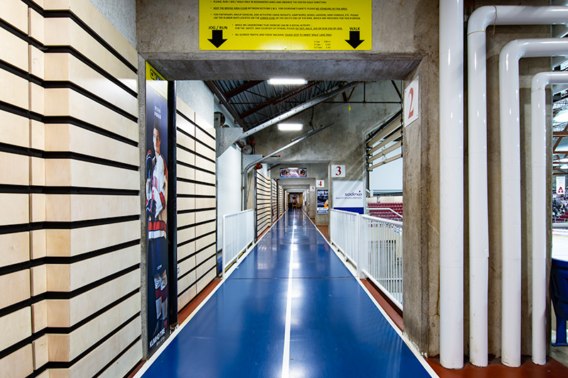 The walking track extends around the entirety of the rink, with designated lanes for walking and running